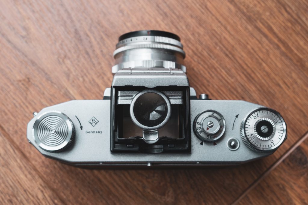 Praktica FX 2 with open viewfinder hood and slide up rear sight in place